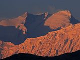 Mustang 02 11-3 Annapurna East, Annapurna Central, and Annapurna Main From Geiling At Sunset My favourite view of Annapurna in Upper Mustang is from Geiling. Here is a close up of Annapurnas East (8026m), Annapurna Central (8051m) and Annapurna (8091m) Main summits at sunset. In front is the Grande Barriere.